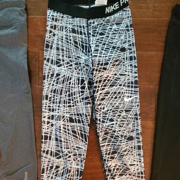 Nike Pants - Nike capris size small black and white